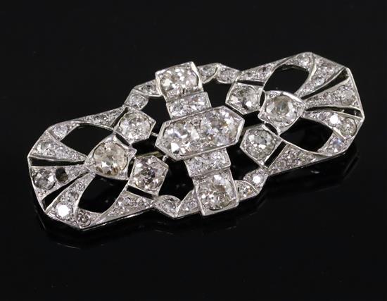 A 1930s/1940s pierced platinum? and diamond set brooch,